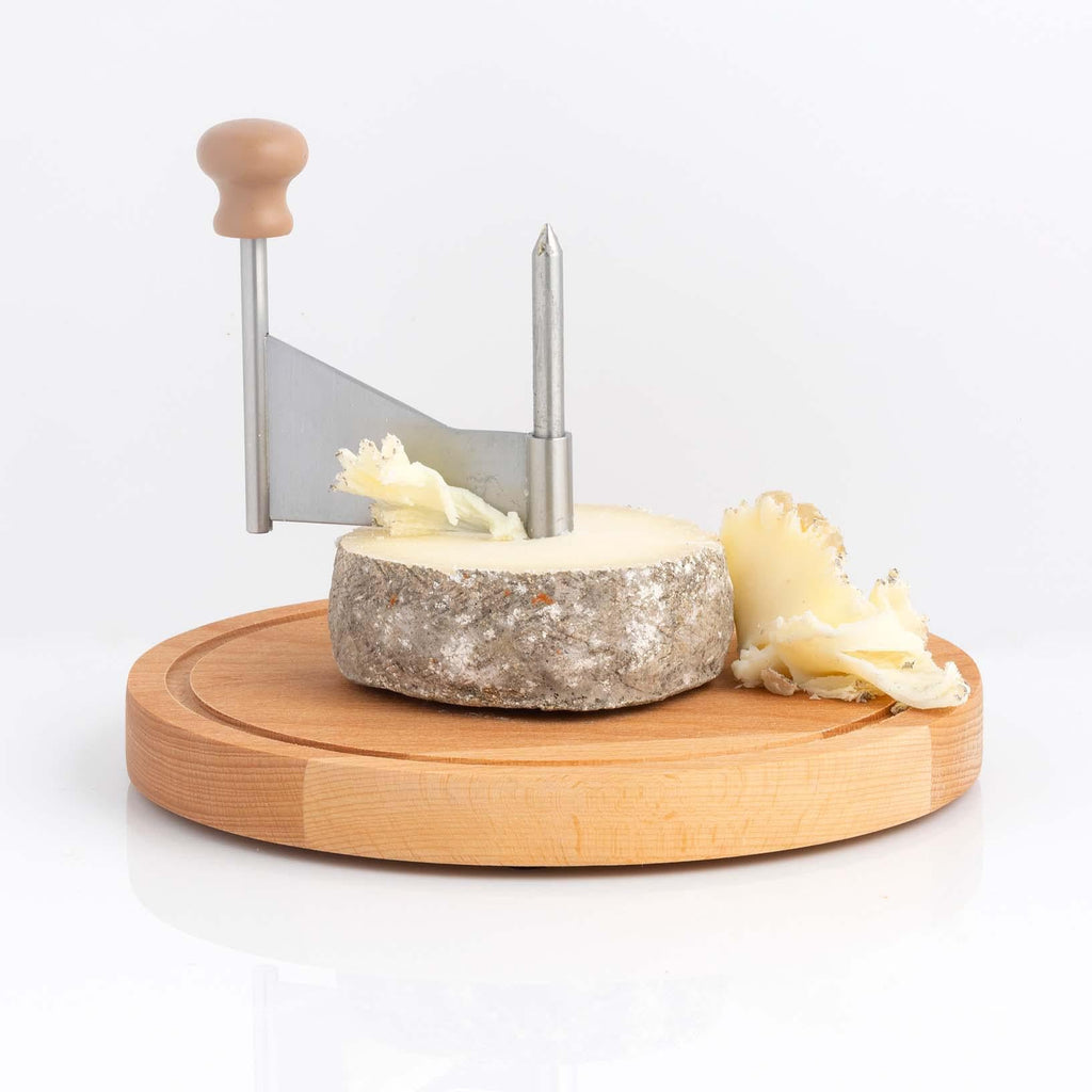 The Girolle : Cheese Curler for International Lunch Buffet Line Stock Image  - Image of device, monk: 77387865
